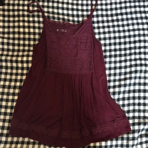Maurice’s burgundy tank
